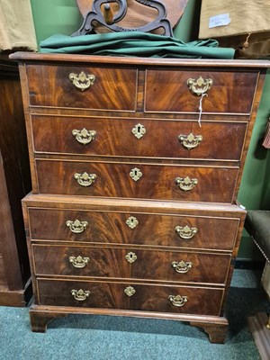 Lot 896 - A mahogany chest on chest with two short...
