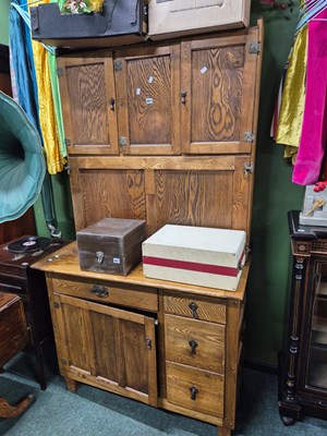 Lot 897 - A pine kitchen cabinet, the recessed upper...