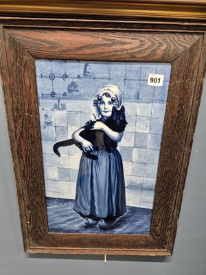 Lot 901 - A framed Delft blue and white tile decorated...