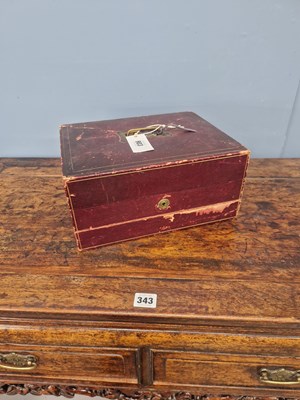 Lot 903 - A red scrim covered and lined writing case...