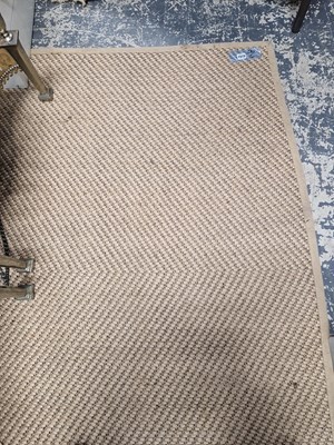Lot 1515 - A Contemporary natural fibre rug. 237 x 171 cm