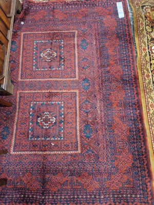 Lot 1521 - A machine made rug of Afghan design
