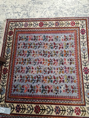 Lot 1524 - An Oriental rug of Caucasian design 102 x 99 cm