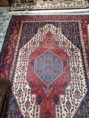 Lot 1532 - A Persian Sennah rug 170 x 103 cm