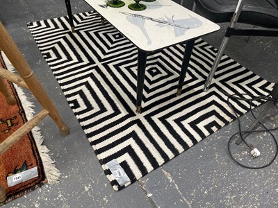 Lot 1542 - A contemporary flat weave rug