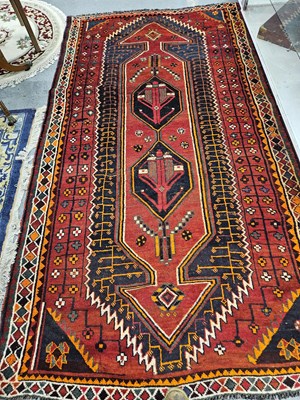 Lot 1543 - A Persian tribal rug 275 x 145 cm