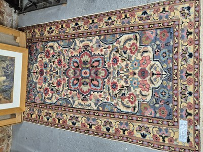 Lot 1545 - An oriental rug of Persian design 180 x 112 cm