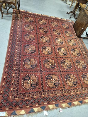 Lot 1553 - An Afghan Bokhara design carpet 297 x 236 cm