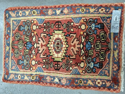 Lot 1556 - A Persian Hamadan mat 82 x 55 cm