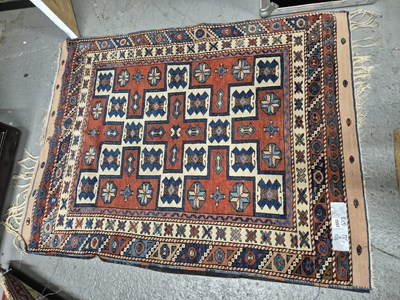 Lot 1557 - A Turkish tribal rug. 135 x 104 cm