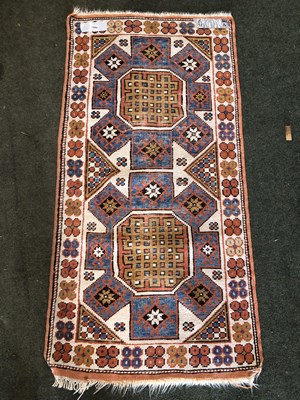 Lot 1560 - A Turkish tribal rug