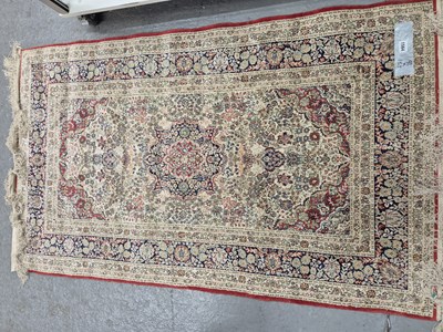 Lot 1564 - A Finely woven oriental silk rug possibly...