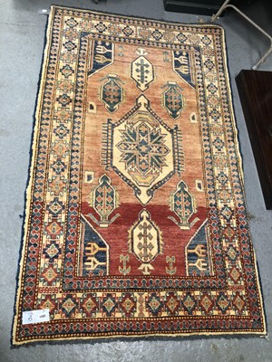 Lot 1565 - An Oriental rug of Caucasian design 190 x 113 cm
