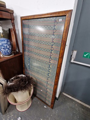 Lot 1002 - A large framed textile.