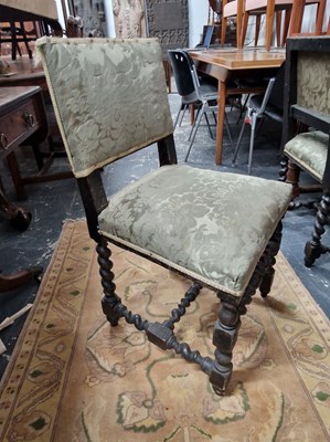 Lot 1012 - A pair of antique oak barley twist legged side...