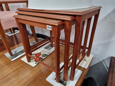Lot 1014 - A retro nest of teak tile topped tables