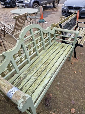 Lot 709 - A painted teak garden bench of...