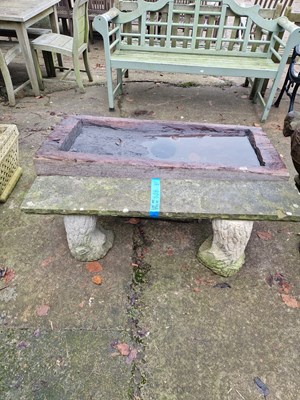 Lot 720 - A weathered stoneware garden seat.