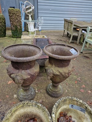 Lot 726 - A pair of large cast iron garden urns of...