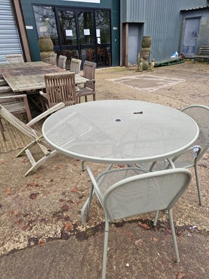 Lot 728 - A modern green-painted patio table and two...