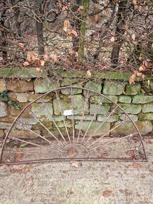 Lot 730 - A wrought iron gateway arch or fanlight guard