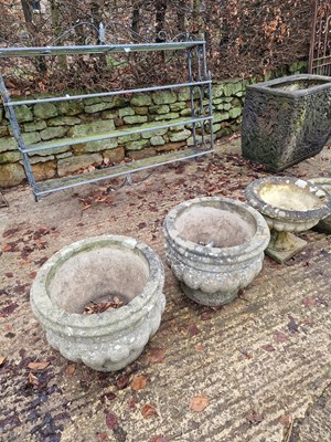 Lot 734 - Three classical style stoneware garden urns.