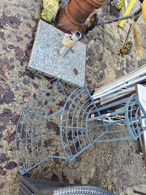 Lot 742 - A small wrought iron three-tier garden plant...