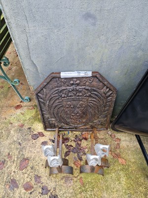 Lot 743 - A cast iron fire back. H 60 W 58 D4 cm
