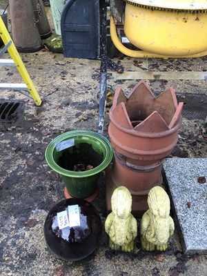 Lot 747a - A castellated chimney pot and three garden...