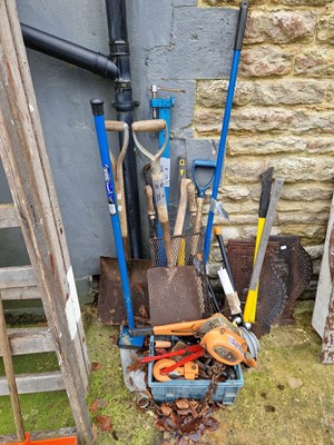 Lot 753a - A qty of tools to include a pick-axe, a hoist,...