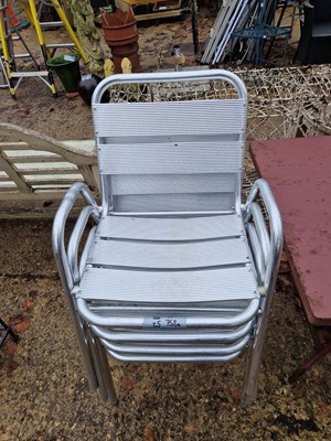 Lot 758a - A set of four alloy patio chairs