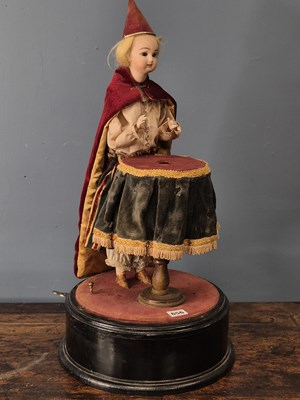 Lot 656 - A 19th-century magician automaton doll, the...