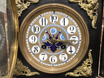Lot 658 - A Victorian aesthetic movement mantle clock in...