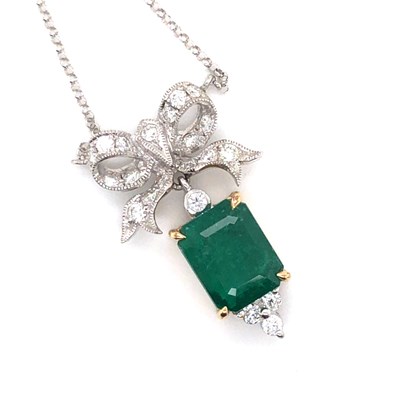 Lot 40 - An emerald and diamond Victorian-style pendant...