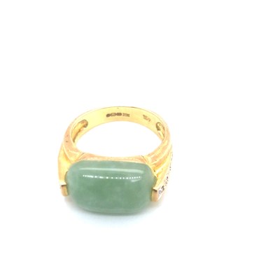 Lot 42 - A 9ct hallmarked gold jade and diamond set...