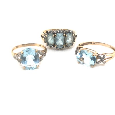 Lot 107 - Three gemset dress rings. One with a 9ct gold...