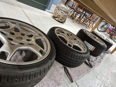 Lot 686 - A set of four Porsche alloy wheels- with new...