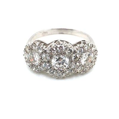 Lot 45 - A triple-diamond cluster ring. The three...