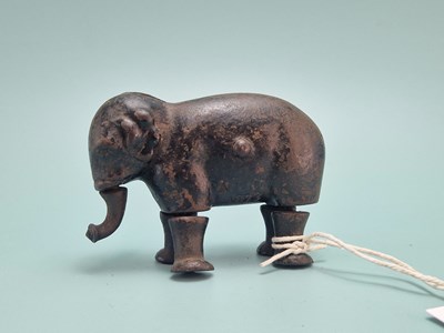 Lot 825 - Late 19th Century cast iron walking elephant...
