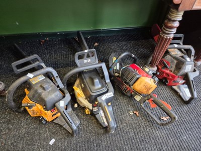 Lot 2052 - Three petrol driven chain saws together with a...
