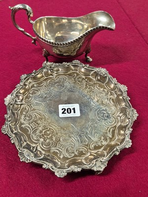 Lot 201 - A Hallmarked silver small three-footed tray...
