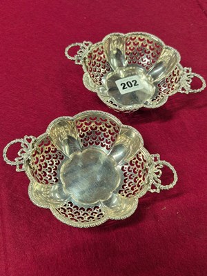 Lot 202 - A pair of silver wreath-handled sweetmeats by...