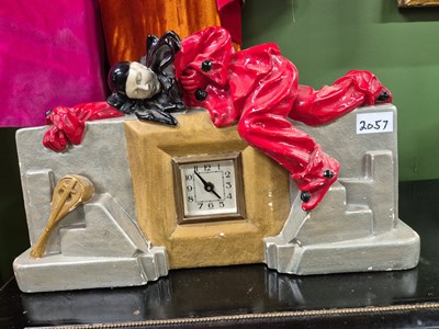 Lot 2057 - A battery driven mantel clock the plaster case...