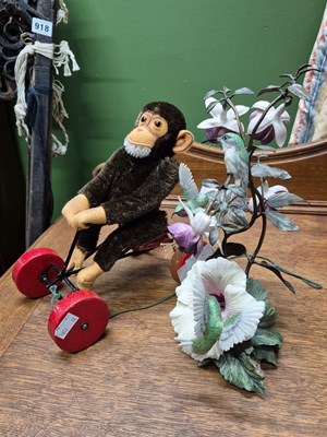Lot 2066 - A pull-along chimp toy together with a...