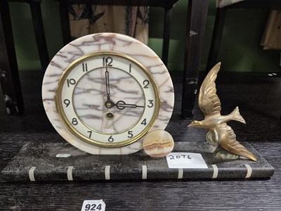 Lot 2076 - An Art Deco mantle clock with a gilt bird...