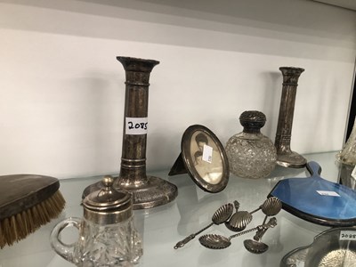 Lot 2085 - A pair of sterling silver candlesticks, silver...