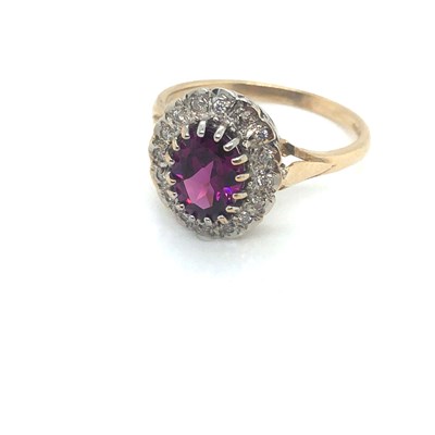 Lot 48 - A 9ct hallmarked yellow and white gold cluster...