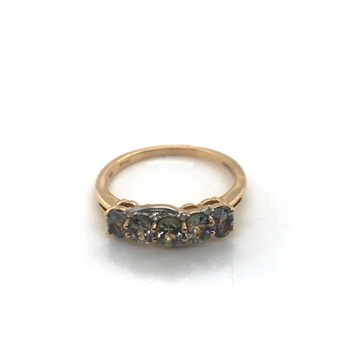 Lot 120 - A 9ct hallmarked gold topaz ring. The five...