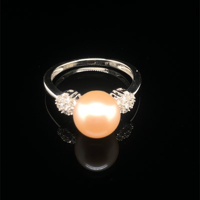 Lot 137 - A 9ct hallmarked white gold pearl and diamond...