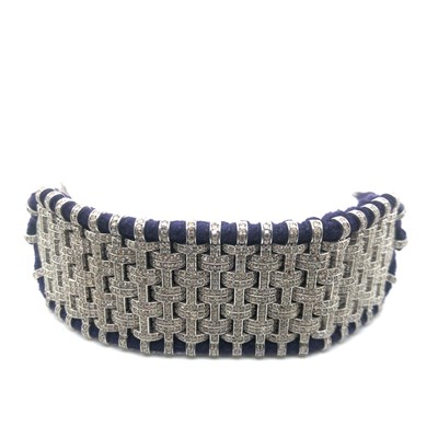 Lot 87 - An unusual woven-style bracelet set with a...